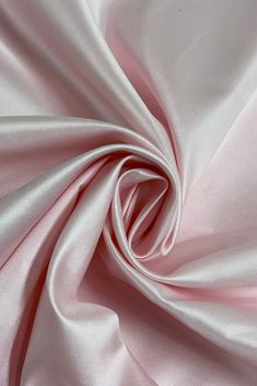 Originally used for bridal wear, this heavier weight twill fabric is perfect for more structured dresses and gowns. The shiny finish and voluminous drape of Pink Italian Satin Organza Fabric adds an elegant touch to any outfit. And the stretch provides more comfort and flexibility. Our luxurious Italian Satin Organza Fabric is available in a wide range of colors. Buy fabric by the Yard at NY Designer Fabrics. The fabric measures 58/60 inches in width. Structured Dresses, Structured Dress, Organza Fabric, Buy Fabric, Twill Fabric, Pink Satin, Bridal Wear, Satin Fabric, Fabric By The Yard