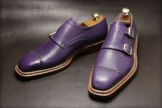 "Dare to stand out with our new hand-stitched cap toe dual monk purple leather strap formal dress shoes. Crafted for the discerning gentleman, these shoes effortlessly blend sophistication with individuality. The striking purple hue adds a pop of color to any ensemble, while the cap toe design exudes timeless elegance. With dual monk straps for added style and functionality, these shoes are perfect for making a statement at formal occasions or adding flair to your everyday attire. Elevate your wardrobe with these unique and meticulously crafted dress shoes." Feel free to customize the description to better suit your style and the specifics of the shoes you're promoting. Purple Shoes Men, Purple Dress Shoes, Formal Dress Shoes, Banana Flower, Cap Toe Shoes, Man Shoes, Hand Stitch, Handmade Leather Shoes, Purple Shoes