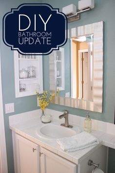 a bathroom with a white sink and blue walls