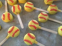 cake pops with yellow frosting and red sprinkles