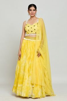 Yellow blouse featuring sunflower embellishment crafted in bead work and has shell tassels on the hem. Paired with a hand dye, embellished waist lehenga and a dupatta. - Aza Fashions Cape Lehenga, Kurta Lehenga, Lehenga Pattern, Lehenga Skirt, Yellow Blouse, Embellished Blouse, Luxury Sale, Bridal Lehenga, Modern Bride