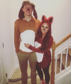 a man and woman are dressed up as the fox and the person in the costume