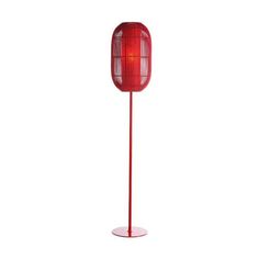 a red floor lamp on a white background