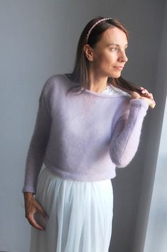 Sweaters, pullovers , women's sweaters , minimalist sweater, cowl neck sweater, white sweater , mohair-silk sweater, soft pullover, silk sweater, ivory pullover, bridal sweater. This knitted sweater is my absolute love. This model is one of the most popular among our clients. Transparent knitwear will look great as a spring or summer image and even winter. :) To create this model, I used the yarn of the famous manufacturers. It perfectly emphasizes the silhouette and line of the bust. The sweate Elegant Mohair Crew Neck Sweater, Elegant Knitted Sweater For Winter, Elegant Soft Knit Mohair Sweater, Elegant Mohair Soft Knit Sweater, Elegant Fitted Hand-knitted Sweater, Elegant Hand Knitted Fitted Sweater, Elegant Fitted Hand Knitted Sweater, Elegant Long Sleeve Knitted Sweater, Minimalist Sweater