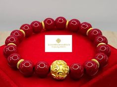 Gift yourself or your love once this Unisex Money Ball Bracelet. Crafted with 24 Karat Gold and Imitation Coral Red Stone.  *Karat: Au999 Pure Gold *Gold Color: Yellow *Gold Weight: Approximately 2.00g *Money Ball Size: Approx.  13.2mm to 14mm *Stone:  Approx. 10mm *Real 24K Gold. NOT gold filled. NOT gold Plated.  ●Money balls or IChing balls represents overflow of good fortune. It is a potent symbol of wealth, blessing and prosperity.   Pls leave us a message if you want to customize your bracelet a certain way and we'll be happy to help you 💥PLS FOLLOW US AND CHECK OUR OTHER LISTINGS. WE HAVE NEW STOCKS LISTED DAILY/WEEKLY.  📬S H I P P I N G WE SHIP WITHIN 24 HOURS. Free shipping in the US and International shipping Gold Wristband With 8mm Beads, Spiritual Gold Bracelet With Round Beads As Gift, Elegant Red Bracelets For Good Luck, Gold Beaded Bracelets For Wedding And Valentine's Day, Gold Crystal Bracelet For Valentine's Day Gift, Jubilee Bracelet Bangle As Gift, Gold Bracelets With Round Beads For Good Luck, Gold Wristband Gift, Yellow Gold Round Crystal Bracelet Gift