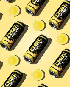 several cans of energy drink with lemon slices