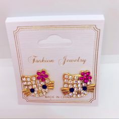 Earrings Crystal Kitty Pierced.Very Brilliant. Brand New In Packaging! Crystals Are Set In Gold Tone With Magenta Pink Bow Trendy Pink Hello Kitty Jewelry, Earrings Hello Kitty, Apple Earrings, Flamingo Earrings, Cactus Earrings, Multicolor Earrings, Fabric Earrings, Rectangle Earrings, Blue Tassel