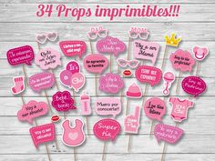 pink cake toppers with the words,'34 propes imprinibles '