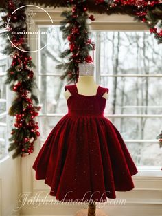 ♥ Introducing our exquisite little girl's red Christmas dress, a perfect blend of elegance and charm designed specifically for your baby girl this festive season. Crafted from luxurious dark red velvet, this handmade dress features a delightful open back adorned with a cute bow that not only enhances its chic appeal but also allows for adjustable styling, ensuring a comfortable fit for your little one. The sleeveless design adds a touch of sophistication, making it an ideal choice for holiday ph Red Princess Dress For Christmas Dress-up, Elegant Christmas Pageant Dresses, Elegant Red Princess Dress For Festive Occasions, Elegant Winter Holiday Princess Dress, Red Princess Dress For Winter Wedding, Elegant Red Dress For Holiday Dress-up, Red Winter Wedding Princess Dress, Fitted Red Princess Dress For Winter, Red Fitted Princess Dress For Winter