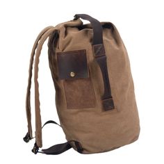 Vintage Canvas Backpack Stylish and Functional Travel Companion - Woosir Brown Canvas Backpack For Adventure, Vintage Backpack With Canvas Lining, Vintage Brown Canvas Backpack, Waxed Canvas Leather Backpack, Travel Leather-trim Coated Canvas Backpack, Cylinder Bag, Brown Leather-backed Adventure Backpack, Canvas Backpacks, Sports Backpack