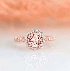 Beautiful Vintage Inspired Morganite Ring ►Base metal: 925 solid sterling silver ►Plating: 14K Rose Gold ►Accented With Simulated Diamonds (CZ) Main Stone: Morganite Stone Creation: Lab-Created Color: Peachy-Pink Stone Cut: Round Gem size: 7.0 x 7.0 mm Carat Weight: 1.5 ct. (approx.) ►Please be aware that plated jewelry naturally fade with wear. If this is a concern we would suggest going with the sterling silver or solid gold option. ►Can be paired with one or two additional bands of your choic Pink Morganite Ring, Rose Gold Accents, Engagement Ring For Women, Morganite Engagement, Pink Morganite, Morganite Engagement Ring, Morganite Ring, Vermeil Jewelry, Silver Engagement Rings