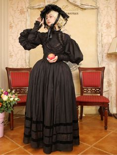 This price includes a blouse, a skirt, and a sash.  This set has a strong Victorian-era day dress inspiration.  This is the size chart for the blouse.   	 		 			Size 			XS 			S 			M 			L 			XL 		 		 			Bust 			82 			86 			90 			94 			98 		 		 			Waist 			64 			68 			72 			76 			80 		 		 			Sleeve Length 			58 			58 			60 			60 			62 		 		 			Full Length 			58 			58 			60 			60 			62 		 	     This is the size chart for the skirt.   	 		 			Size 			XS 			S 			M 			L 			XL 		 		 			Waist 			58-64 Historical Design Vintage Dress For Costume, Vintage Long Sleeve Theater Dress, Victorian Style Dresses For Fall, Black Long Sleeve Dress With Historical Design, Victorian Style Vintage Dress For Costume, Victorian Vintage Dress For Costume, Victorian Dress For Theater With Historical Design, Black Regency Dress For Costume Party, Black Regency Style Dress For Costume Party