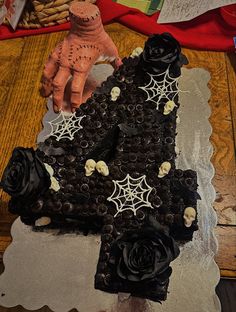 Black, spooky, goth, Addams family, the thing Wednesday Addams Strawberries, Wednesday Addams Cupcake Cake, Diy Wednesday Addams Cake, Wednesday Addams Centerpiece Ideas, Wednesday Addams Treats, Wednesday Addams Cake Pops, Wednesday Addams Cakes, Wednesday Adams Cake Ideas