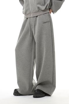 Experience the perfect blend of comfort and style with our Oversized Cropped Zip Hoodie and Wide-Leg Sweatpant Jogger Set. Designed for a relaxed fit and crafted from high-quality fabric, this set ensures effortless ease and a contemporary edge. The hoodie features a cozy zip-up design and shoulder padding for an urban, structured look, paired with a stylish hood. The wide-leg sweatpants complement the top with a fluid, fashion-forward silhouette. Together, they create a harmonious ensemble that Wide Leg Sweatpants, Tracksuit Set, Urban Wear, Jogger Set, Set Outfit, Comfortable Outfits, Comfy Outfits, Comfortable Fashion, New Outfits