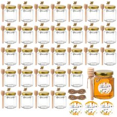 a bunch of glass jars with wooden spoons and stickers next to each other