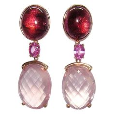 Earrings Pink Gold 18 K Gianni Lazzaro Diamonds brown 4-0,08 ct GSI Rosa Sapphire 2-0,86ct Rosa Quartz 2-18,75 Tourmaline Cabochon 2-9,26ct Weight 12,30 gram With a heritage of ancient fine Swiss jewelry traditions, NATKINA is a Geneva based jewellery brand, which creates modern jewellery masterpieces suitable for every day life. It is our honour to create fine jewelry, and it’s for that reason that we choose to only work with high-quality, enduring materials that can almost immediately turn int Elegant Rose Gold Multi-stone Earrings, Luxury Rose Gold Earrings With Gemstone Accents, Luxury Pink Multi-stone Earrings, Elegant Red Multi-stone Earrings, Elegant Pink Gemstones With Accents, Formal Briolette Earrings With Gemstone Accents, Luxury Oval Pink Earrings, Formal Rose Gold Earrings With Gemstone Accents, Luxury Pink Oval Earrings