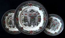 three plates with designs on them sitting next to each other in front of a black background