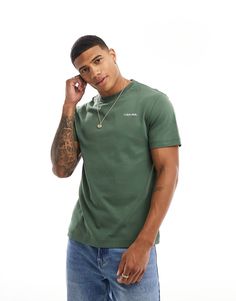 T-Shirts & Tank tops by Calvin Klein Your new go-to Crew neck Short sleeves Logo print Regular fit Calvin Klein Logo Cotton Tops, Calvin Klein Cotton Logo Tops, Calvin Klein Cotton Tops With Logo, Casual Green T-shirt With Logo, Calvin Klein Relaxed Fit Crew Neck T-shirt, Calvin Klein Crew Neck T-shirt With Logo, Calvin Klein Logo Print Crew Neck T-shirt, Calvin Klein Crew Neck Top With Logo Print, Calvin Klein Logo Print Crew Neck Top