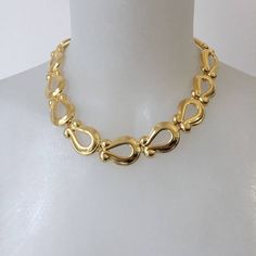 Beautiful vintage gold tone metal choker  Flexible snake-like construction Length: 45 cm / 17.7 '' Width: 2 cm / 0.78 '' Excellent condition Shipping will be charged only once when ordering multiple items from my shop More quality vintage items in my Etsy shop: https://www.etsy.com/shop/styled64 Gold-tone Necklaces With Gold Clasp For Formal Occasions, Formal Gold-tone Necklaces With Gold Clasp, Formal Gold-tone Necklace With Gold Clasp, Gold Chain Necklace With Gold Clasp For Formal Occasions, Gold Metal Snake Chain Choker, Elegant Metal Chain Necklace With Gold Clasp, Retro Yellow Gold Necklace For Formal Occasions, Formal Brass Choker, Vintage Gold-tone Metal Chain Necklace