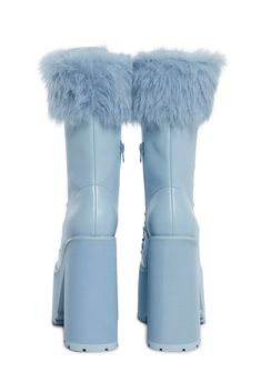 Look cute at the ski lodge with these boots that have a vegan leather construction, a faux fur trim, platform treaded soles, block heels, a front-lace-up design, and side zipper closures. Diy Fur Boots, Fur Leg Warmers, Shoe Pics, Vegan Leather Boots, Snow Bunny, Sugar Thrillz, Snow Bunnies, Ski Lodge, Blue Boots