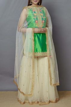 Shop for Preeti S Kapoor Cream Dupion Embroidered Kurta Sharara Set for Women Online at Aza Fashions Embroidered Pista Green Sharara In Organza, Embroidered Pista Green Organza Sharara, Green Embroidered Fabric With Dori Work, Pista Green Embroidered Fabric With Dori Work, Unstitched Pista Green Sharara With Floral Embroidery, Embroidered Pista Green Sharara For Transitional Season, Pista Green Sharara With Floral Embroidery, Festive Pista Green Sharara With Floral Embroidery, Pista Green Embroidered Fabric For Festive Occasion