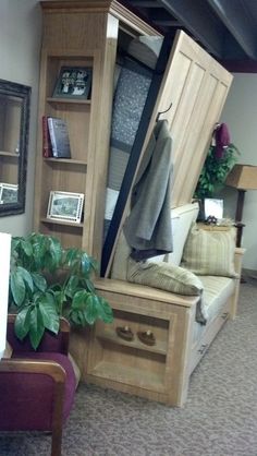 a living room filled with furniture and lots of clutter