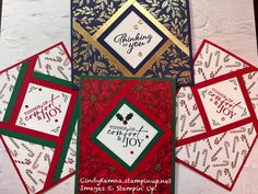 four christmas cards with the words, thank you and merry joy written on each card