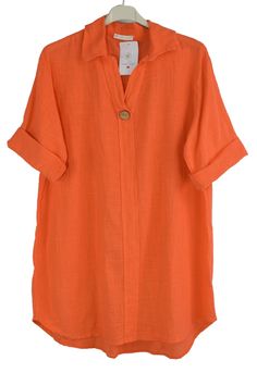 Stay cool and stylish this summer with our Cotton Collared Tunic Top. Made from lightweight cotton, this top features a chic collared neckline and button detailing. Perfect for casual outings, this top will keep you comfortable and on-trend all season long. Cotton Collared Tunic Top for Summer with Button Detailing Collared Neckline Button Detail 3/4 Sleeves One Size (10-16) Soft and Lightweight Perfect for Spring / Summer 100% Cotton Made in Italy Size Details (Approx): Length (Front) - 31" Len Orange Cotton T-shirt For Summer, Orange Button-up Tops For Summer, Orange Button-up Summer Top, Summer Orange Button-up Top, Stretch Cotton Orange T-shirt, Cotton Tunic, Top For Summer, Casual Top, Womens Tunics