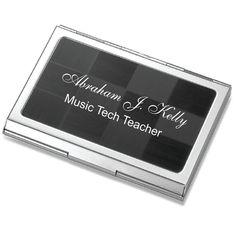 a black and silver business card case with the words music tech teacher written on it