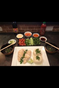 the meal is prepared and ready to be eaten on the kitchen counter, with chopsticks in front of it