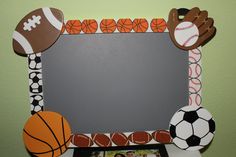 a photo frame decorated with sports themed items