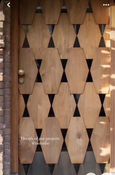 a wooden door with geometric designs on it