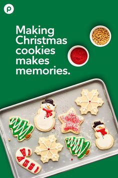 christmas cookies on a baking sheet with the words making christmas cookies makes memories