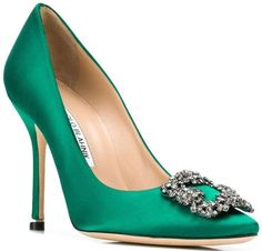 Manolo Blahnik is the definition of elegance. An iconic shoe from the Spanish designer’s collection, these charming, feminine and romantic Manolo blahnik Hangisi pumps are exquisitely crafted from lustrous green satin and kid leather. They feature an almond toe completed with an immediately recognisable Swarovski crystal embellished buckle to the front, making them a perfect choice for sophisticated wearer. Noble Lady