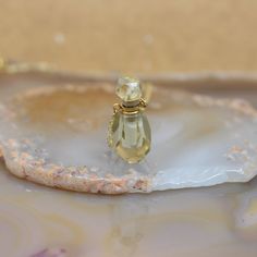 Material : Natural Crystal Quartz Shape: Faceted Bottle Color: As Picture Size(Approx): 14-18x30-37mm To see more Perfume Bottle Pendant : https://www.etsy.com/shop/Forbeads?section_id=27292001 Shop home for more items: https://www.etsy.com/shop/Forbeads We are wholesale manufacturer,Welcome bulk order and cutomized design. Pls feel free to contact us if any question or more request. Nice shopping in Forbeads Citrine Crystal Necklace Gift, Crystal Girl, Bottle Pendant, Chakra Pendant, Bottle Necklace, Necklace Pendants, Copper Chain, Crystal Quartz, Picture Size