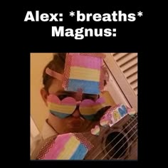 a person wearing sunglasses and holding a guitar in front of their face with the caption alex breaths magnaus