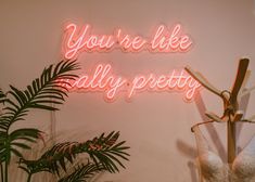 a neon sign that says you're like ally pretty on the side of a wall