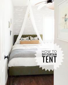 a bed with a white canopy over it