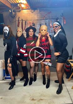 four people in costumes posing for a video