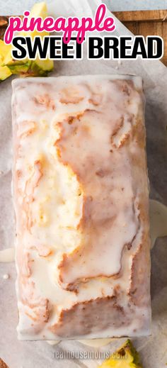 a loaf of pineapple sweet bread sitting on top of wax paper