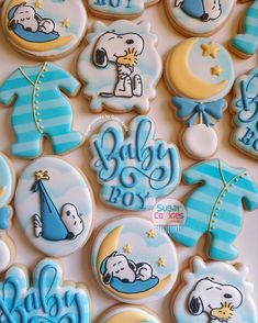 baby boy cookies decorated with blue and white icing