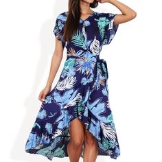 Elevate your summer wardrobe with the Anna-Kaci Women's Tropical Print High-Low Wrap Dress. This eye-catching dress features a vibrant tropical print that exudes island vibes, perfect for warm-weather adventures. The wrap design offers a flattering fit, accentuated by a waist tie that cinches beautifully at the waist. Flutter sleeves add a touch of femininity, while the high-low hemline provides a playful yet elegant silhouette. Whether you're headed to a beachside brunch or a casual day out, th Flowy V-neck Beach Dress With Tropical Print, Summer Tropical Print Midi Dress For Day Out, Summer Midi Dress With Tropical Print, Summer Tropical Print Midi Floral Dress, Summer Tropical Print Midi Dress, Summer Brunch Maxi Dress With Tropical Print, Summer Beach Midi Dress With Vibrant Print, Casual Tropical Print Midi Dress For Summer, Tropical Short Sleeve Maxi Dress For Spring