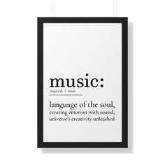 a black and white poster hanging on a wall with the words music written in different languages