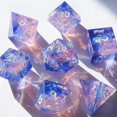 blue and white dice laying on top of each other