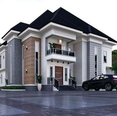 a black car is parked in front of a large white and brown building with balconies