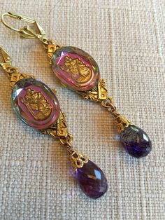 Vintage Brass Finding. Vintage Pink/Purple Cabochon. Genuine Faceted Moss Amethyst Briolettes. Vintage Brass Leverback Closure. Size : 2 3/4 inches.               (7 cm) Adjustable Purple Jewelry With Lever Back Ear Wires, Purple Clip-on Jewelry As Gift, Purple Clip-on Jewelry Gift, Purple Clip-on Jewelry For Gifts, Purple Clip-on Jewelry For Gift, Purple Clip-on Jewelry As A Gift, Vintage Purple Cabochon Jewelry, Vintage Purple Teardrop Earrings, Vintage Purple Teardrop Jewelry