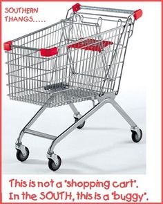 a silver shopping cart with red handles