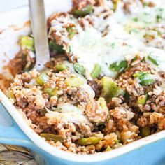 a casserole dish filled with meat and vegetables