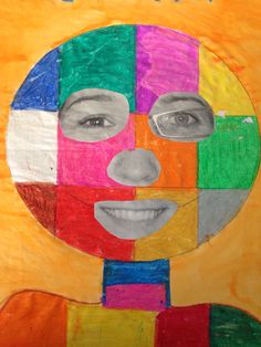 a child's face made out of colored paper with the words happy birthday written on it