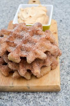 a wooden board with some food on it